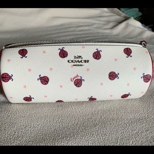 traveling coach purse. NWOT